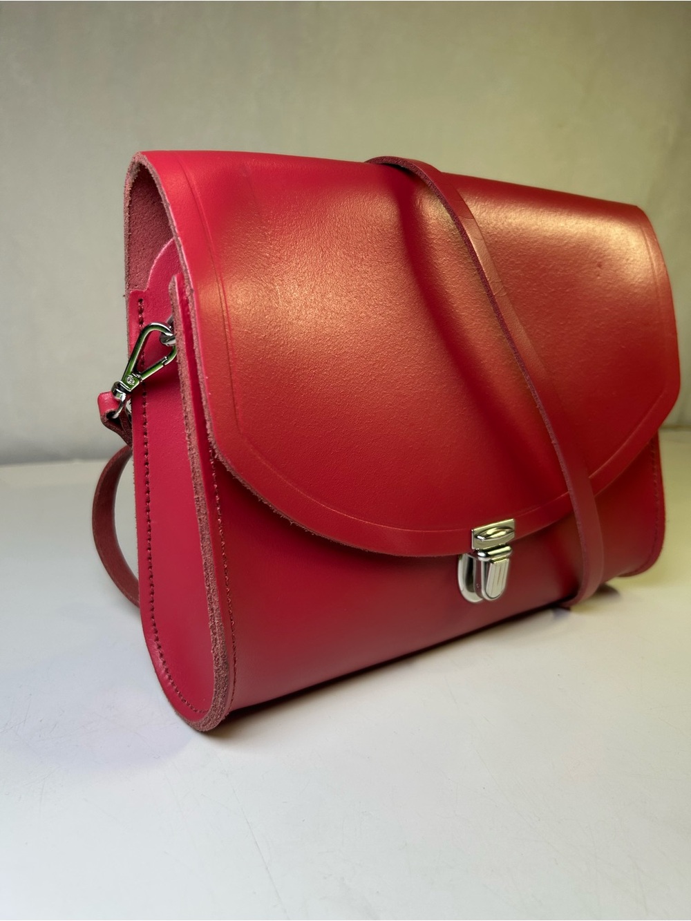 The Cambridge Satchel Company Pushlock Crossbody Bag Red Leather.
